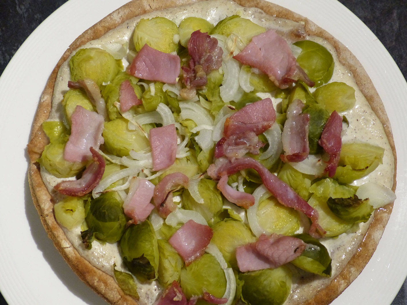 Pizza with brussels sprouts and 'bacon'